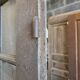 Two pairs of solid oak doors with small panes.