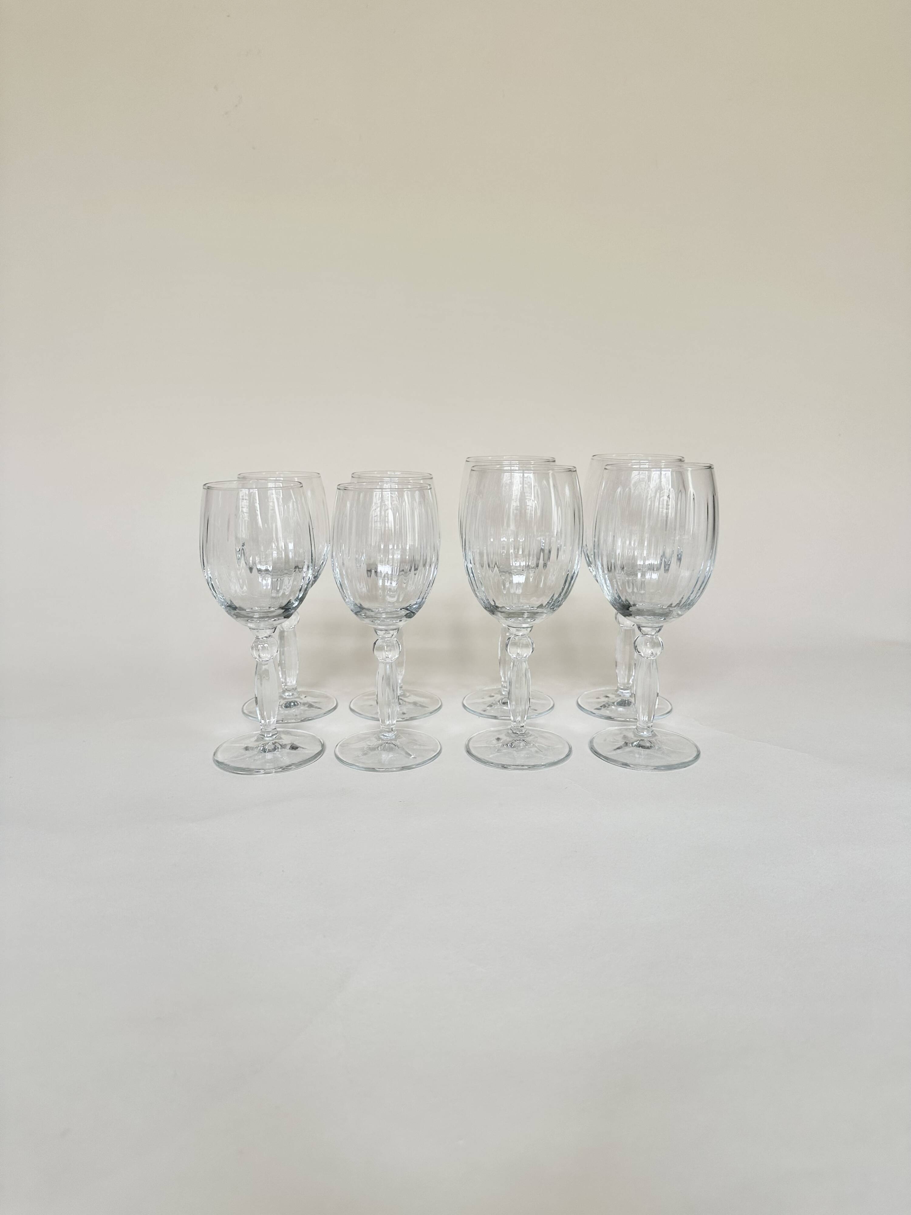 Set of 4 water glasses and 4 wine glasses, swirling glass