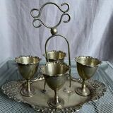 Antique egg set in nickel silver metal