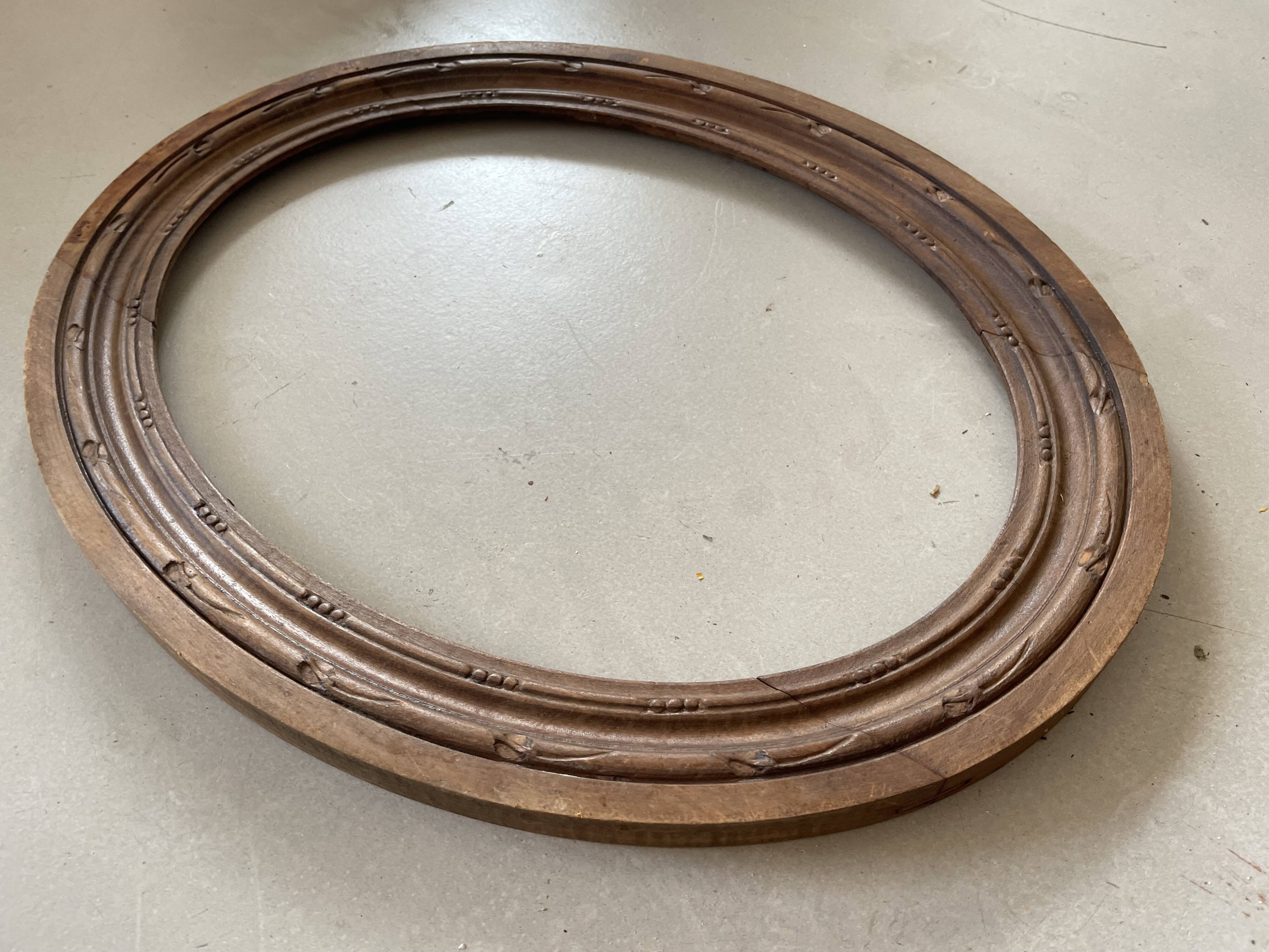 Oval old wooden frame
