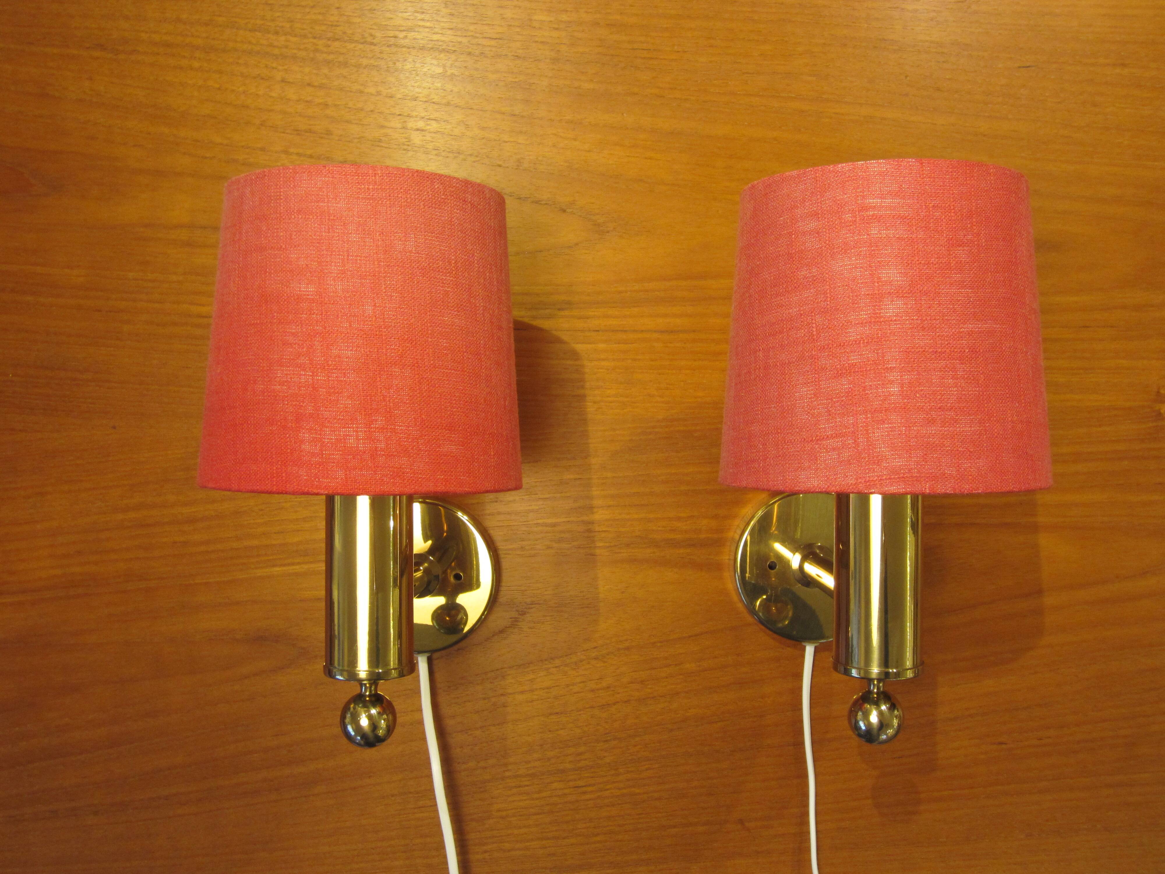 Pair of golden Scandinavian wall lights by Bergboms