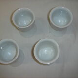 4 white porcelain cockroaches from 1970