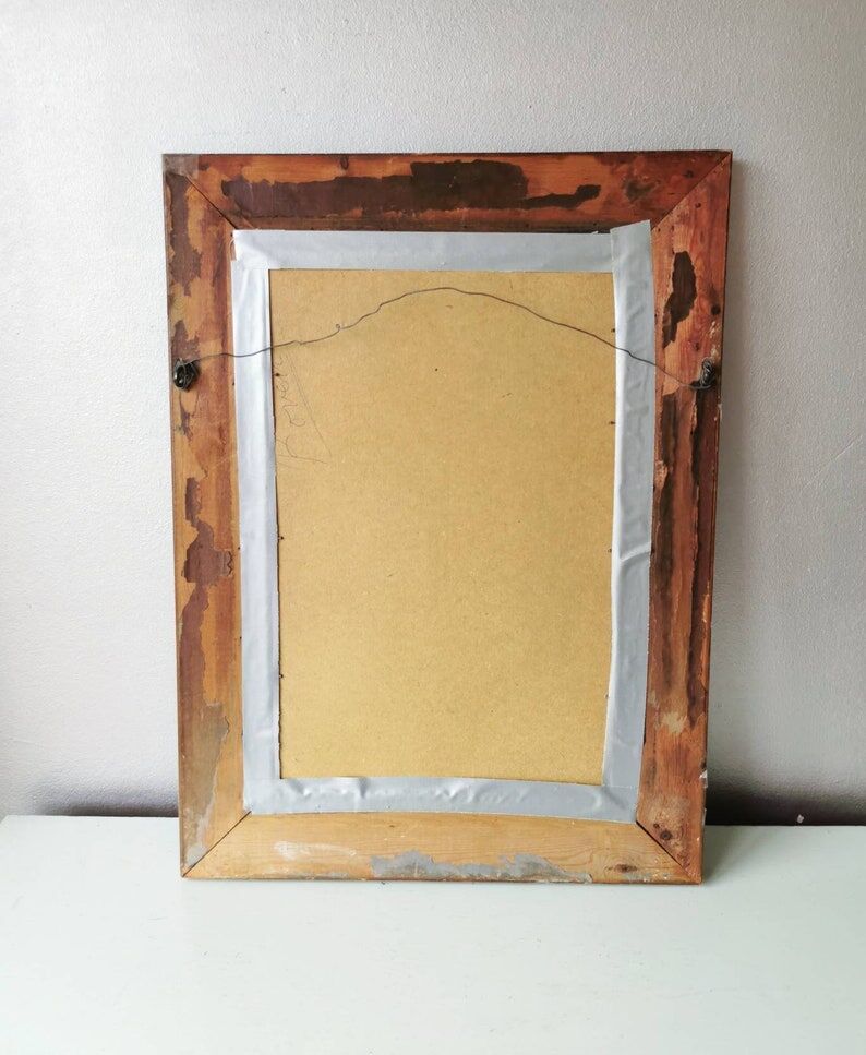 Beautiful French vintage mirror in gilded wood from the 60s