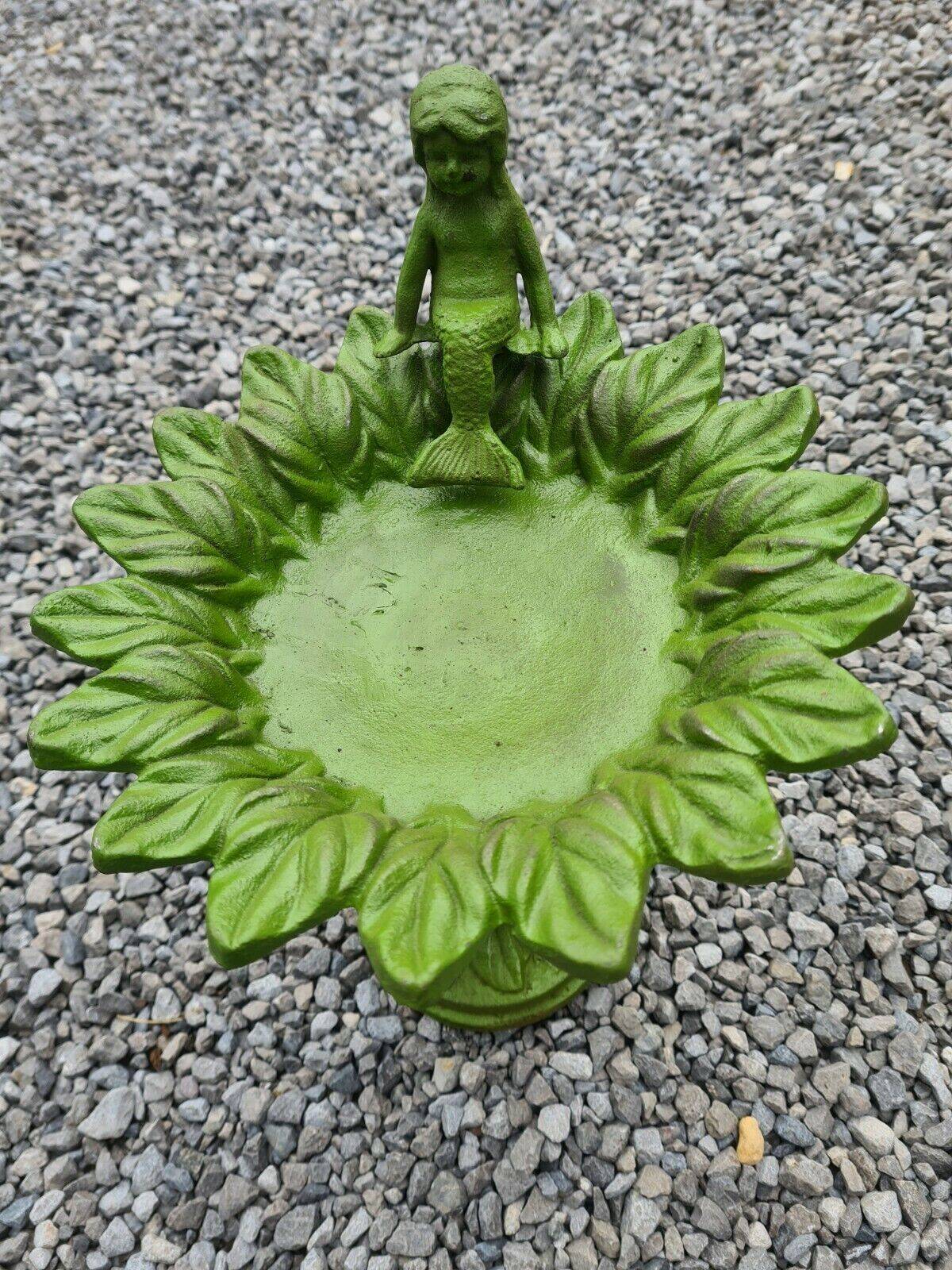Cast iron birdbath with a mermaid