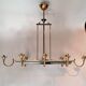 Eight-light chandelier in gilded brass and blue, 1950.