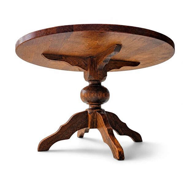 Table à manger en chêne massif, également connue sous le nom de table de monastère, avec un piédestal central robuste et une construction solide.