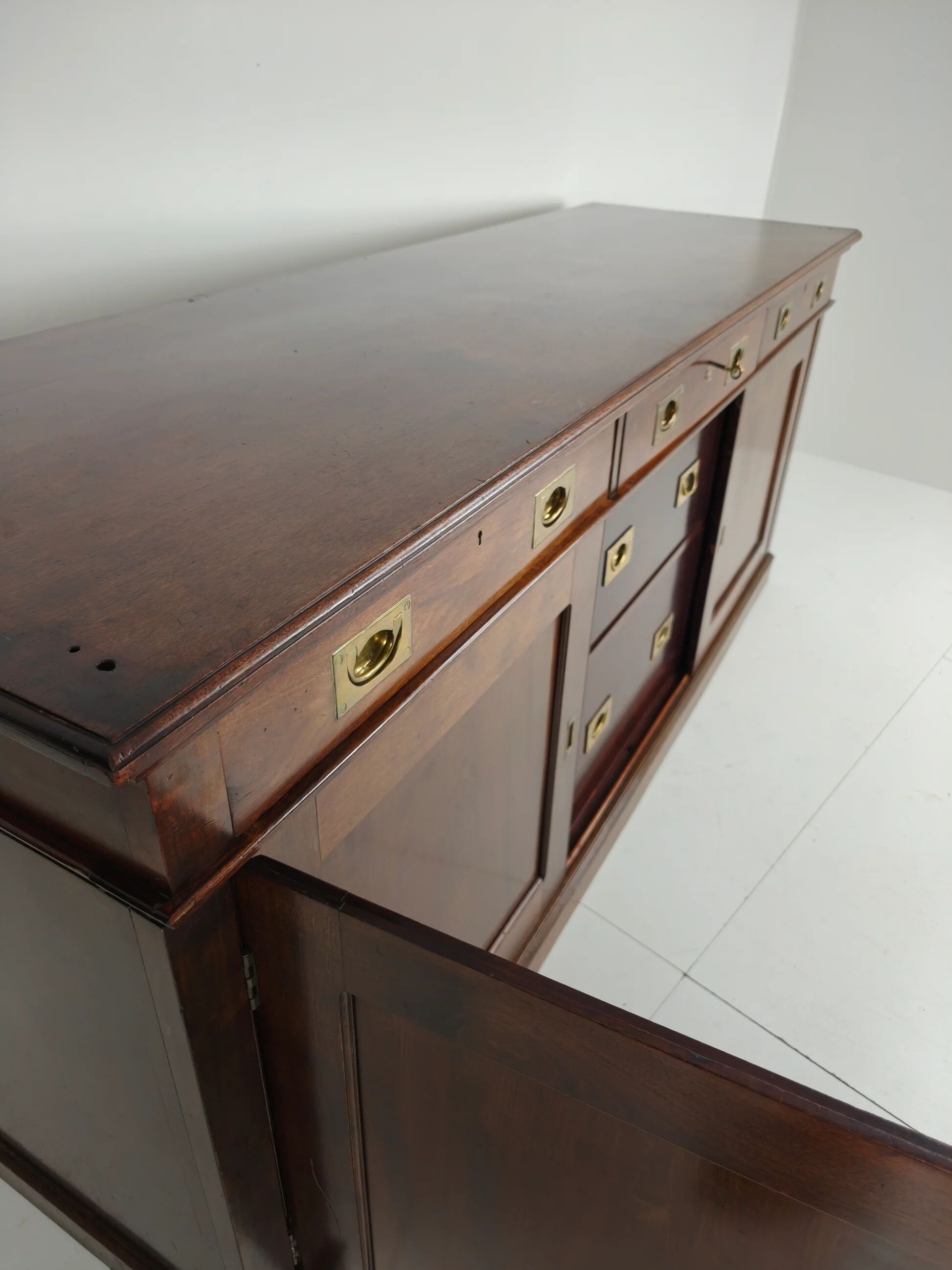 Early 20th-century English mahogany dresser / sideboard – brass campaign hardware