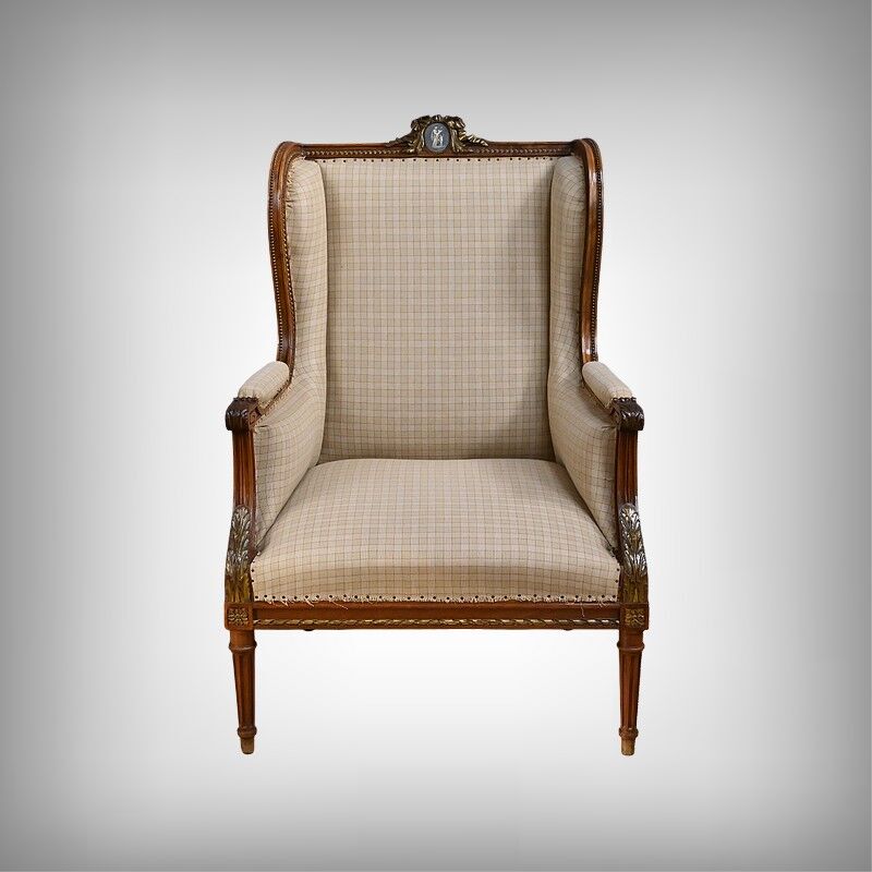 Wingback armchair in walnut, Louis XVI style – late 19th century