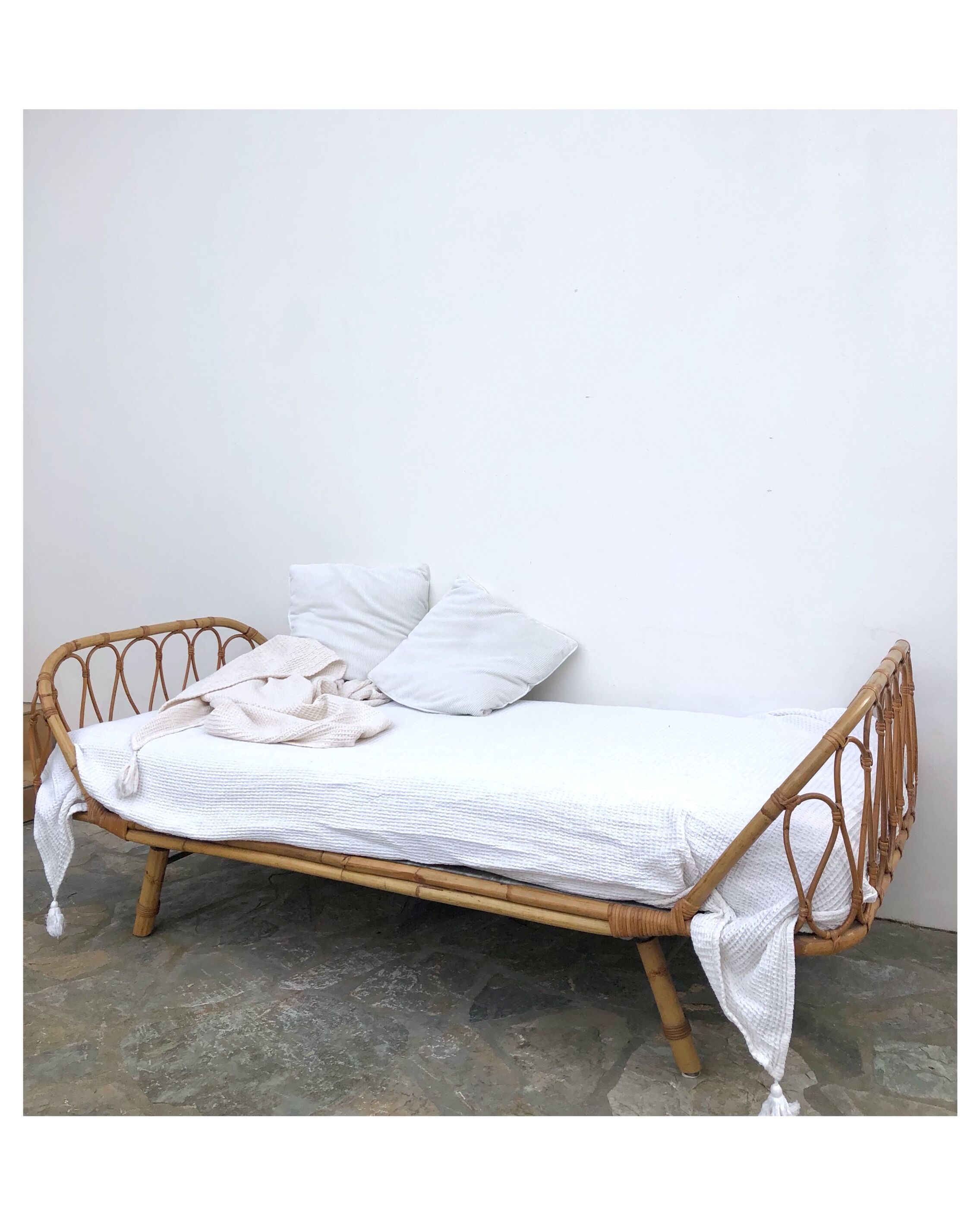 Vintage rattan bed