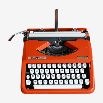 Machine à écrire portative Japy Baby orange écriture cursive