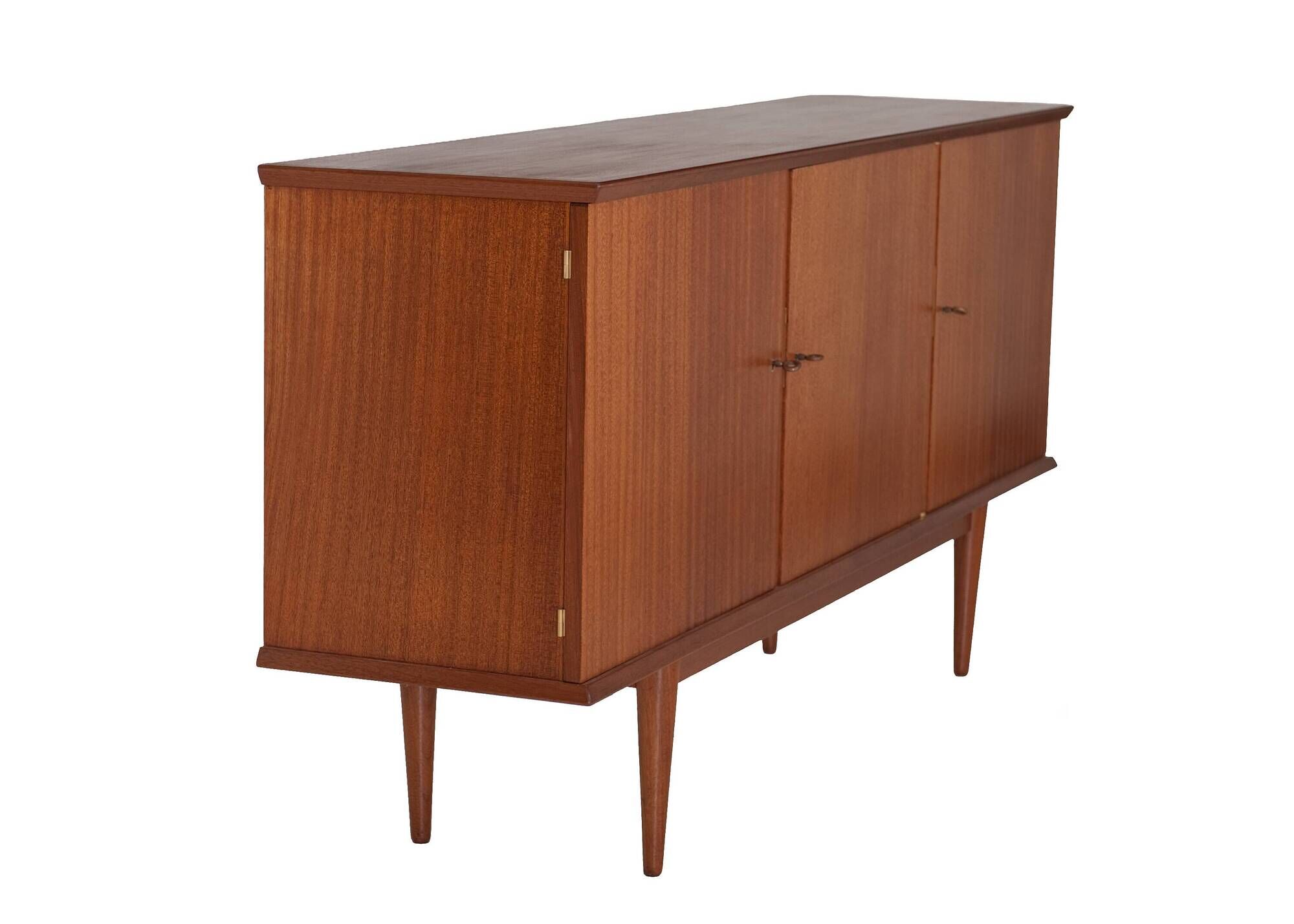 Scandinavian teak sideboard with 3 doors from the 1960s.