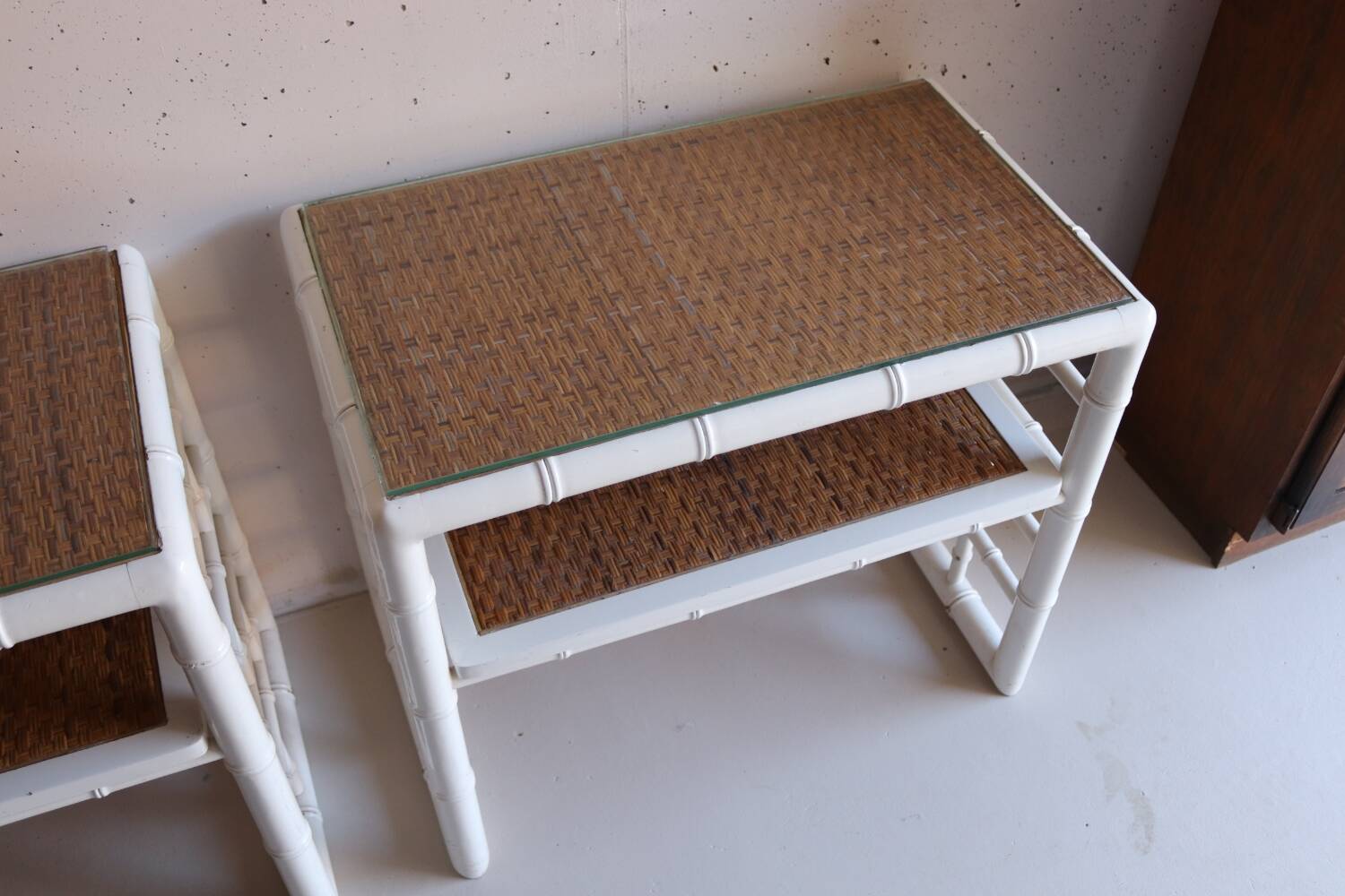 Pair of bedside tables in bamboo effect wood and woven wicker