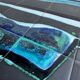 Mid-century Denisco ceramic coffee table — black, blue and white glazed tile top with silver metal base