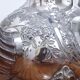 Silver metal teapot in Louis XV style