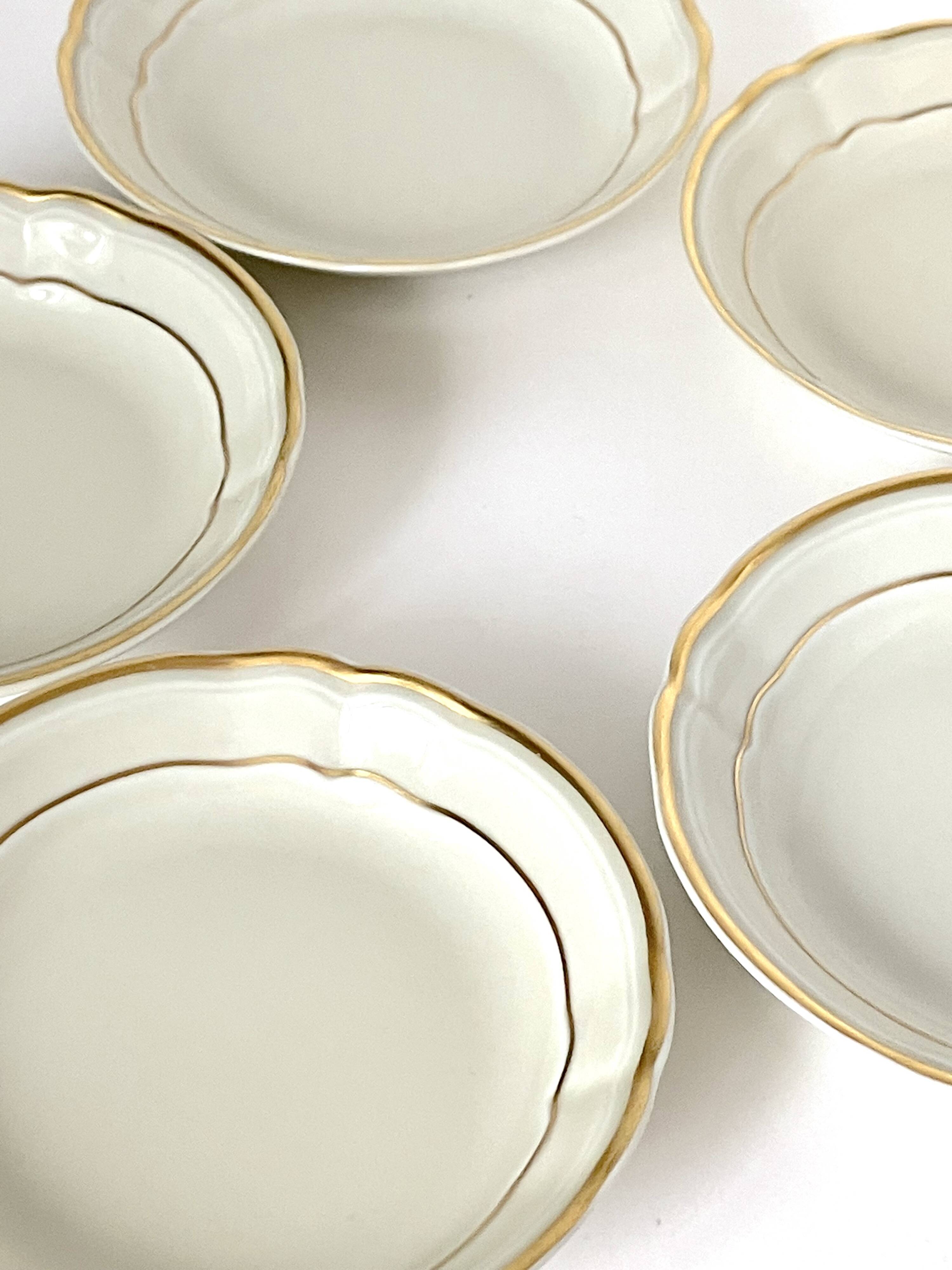 5 Bernardaud Limoges porcelain dessert bowls, Louis XV model, ivory with gold edging
