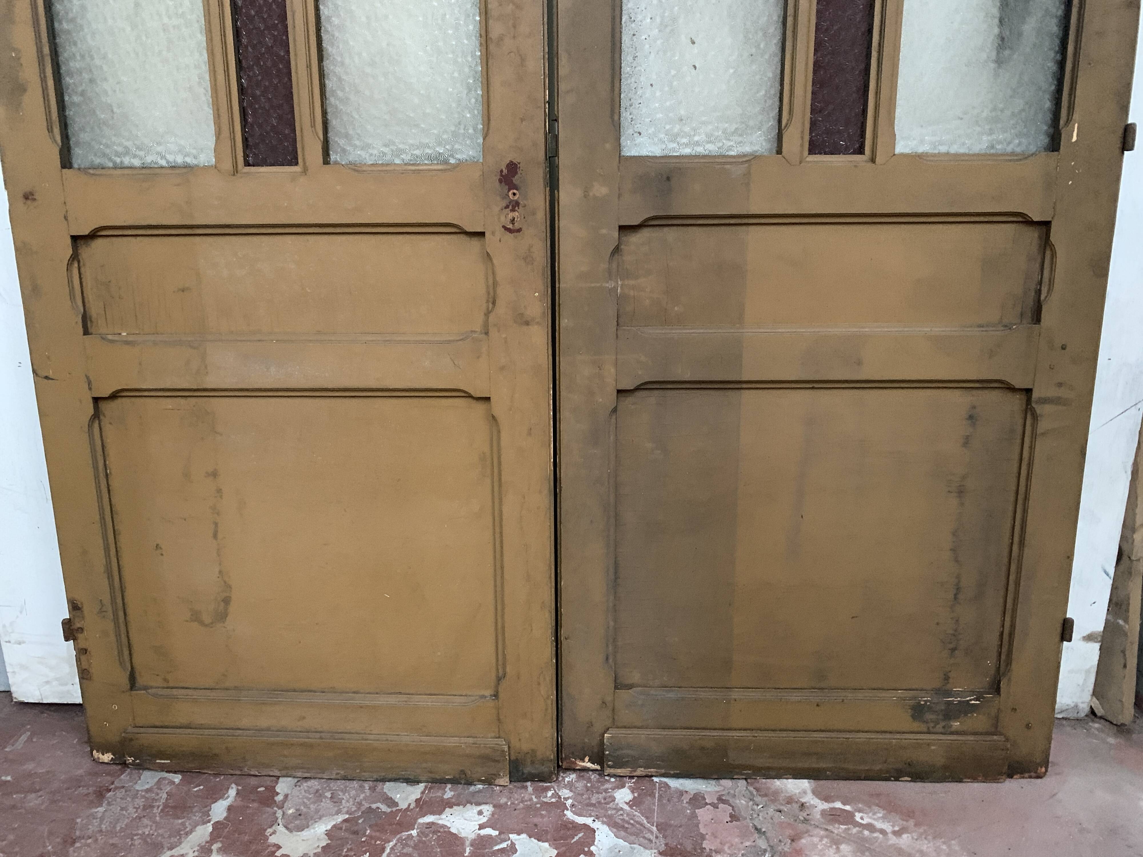 Double glass and patinated fir passage doors, 20th century
