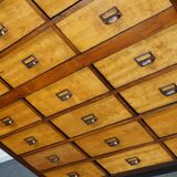 School cabinet bank of vintage Dutch drawers in mid-twentieth century pine