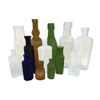 Set of old bottles colored glass