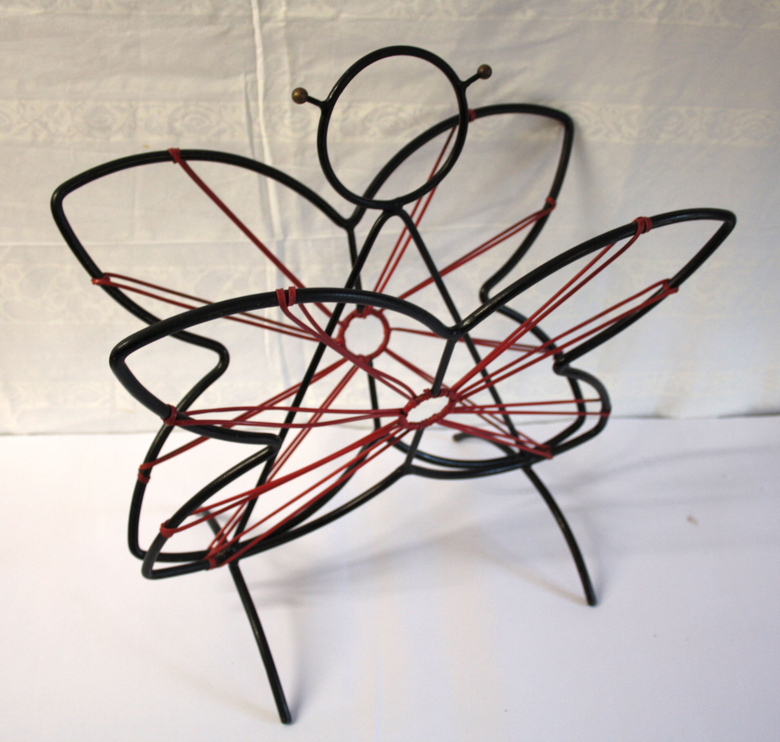 Magazine rack scoubidou 'butterfly' circa 60