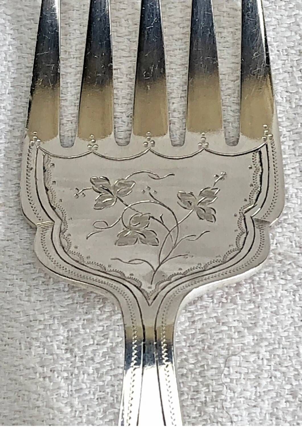 Antique Victorian fish serving cutlery, bone and silver-plated metal