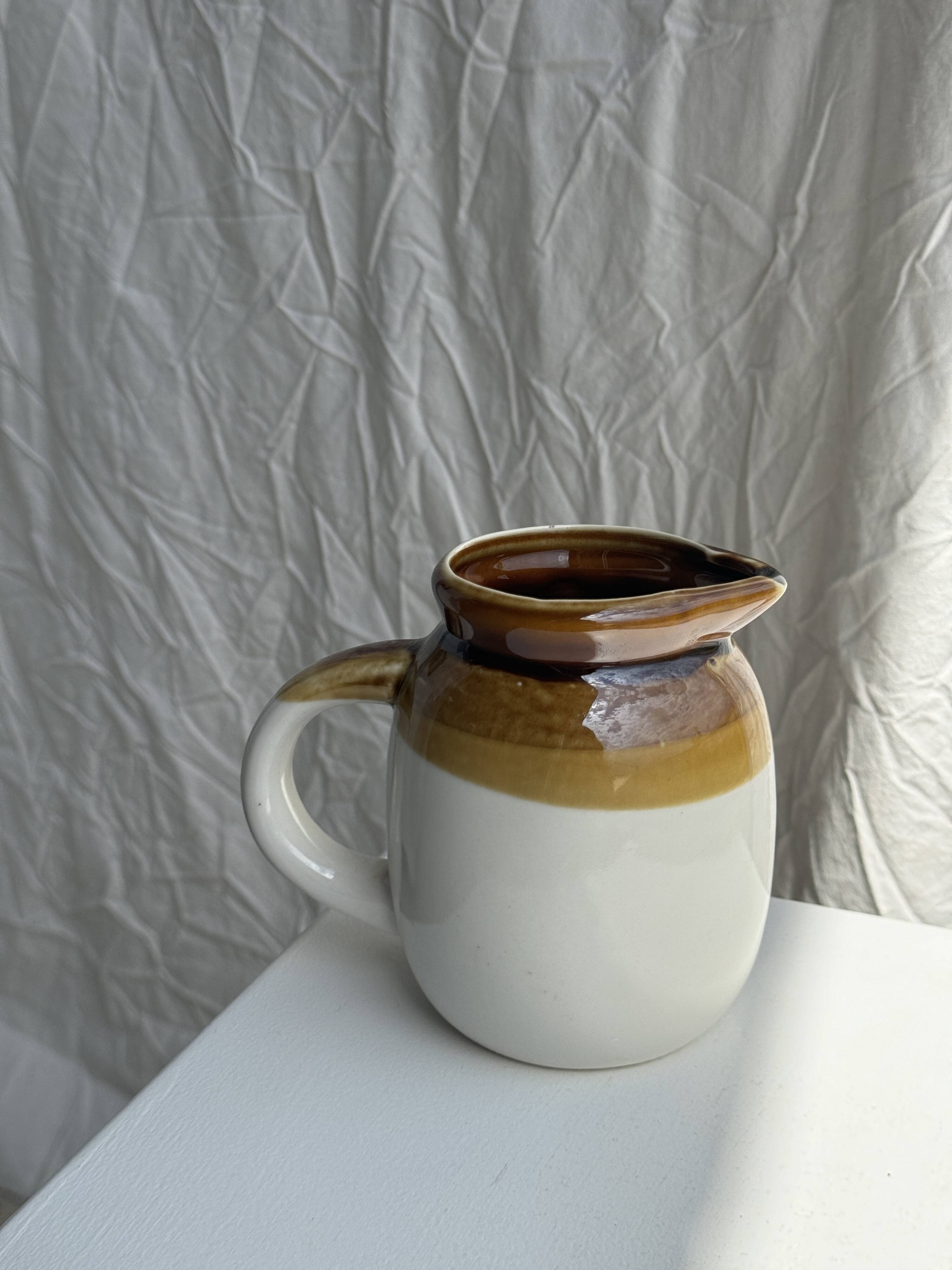 Small two-tone white and brown pitcher Made in China