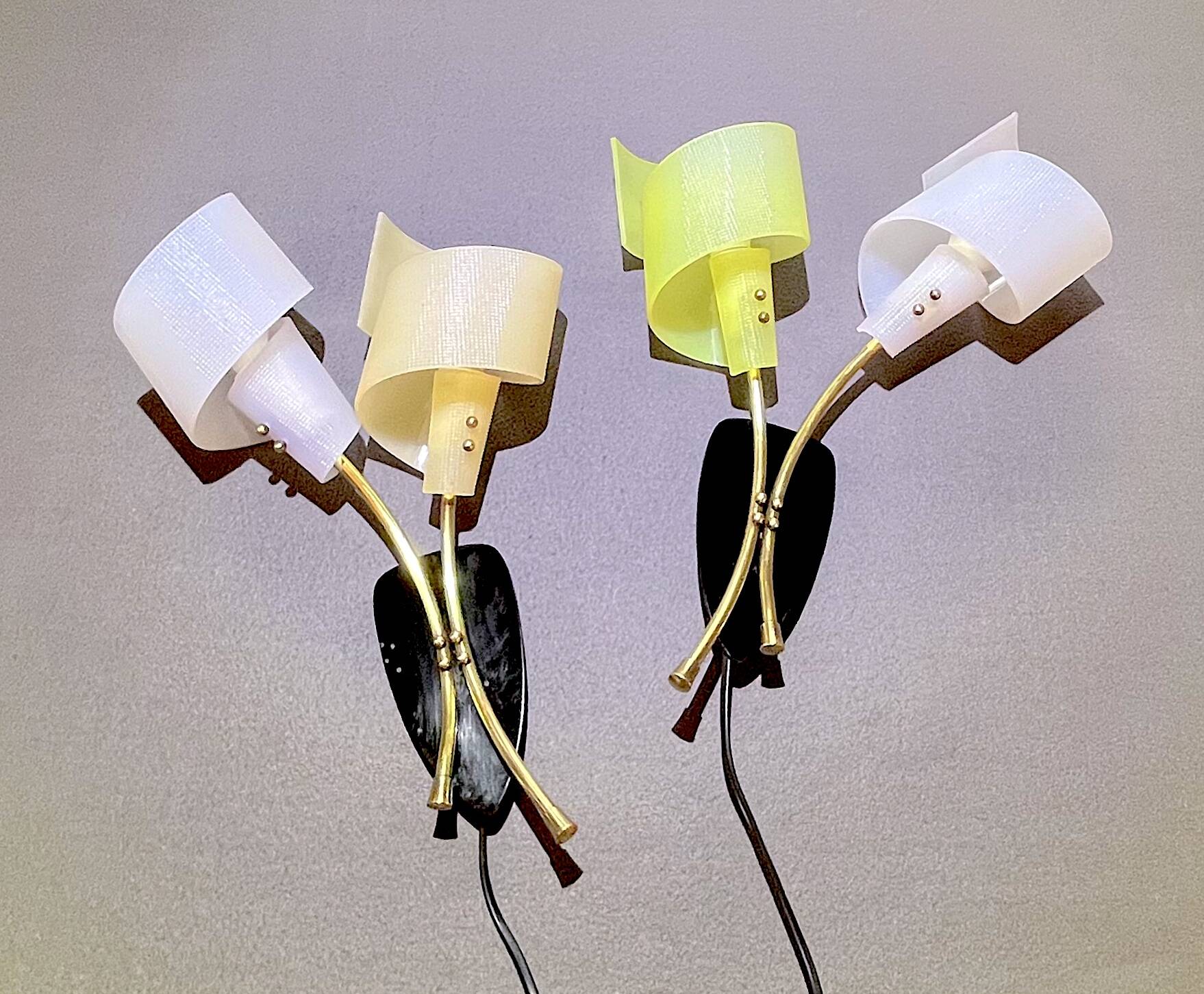Pair of "vintage" wall lights in brass, perspex, and black bakelite, France Mid-Century