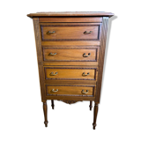 Louis XVI style molded and carved walnut chest of drawers