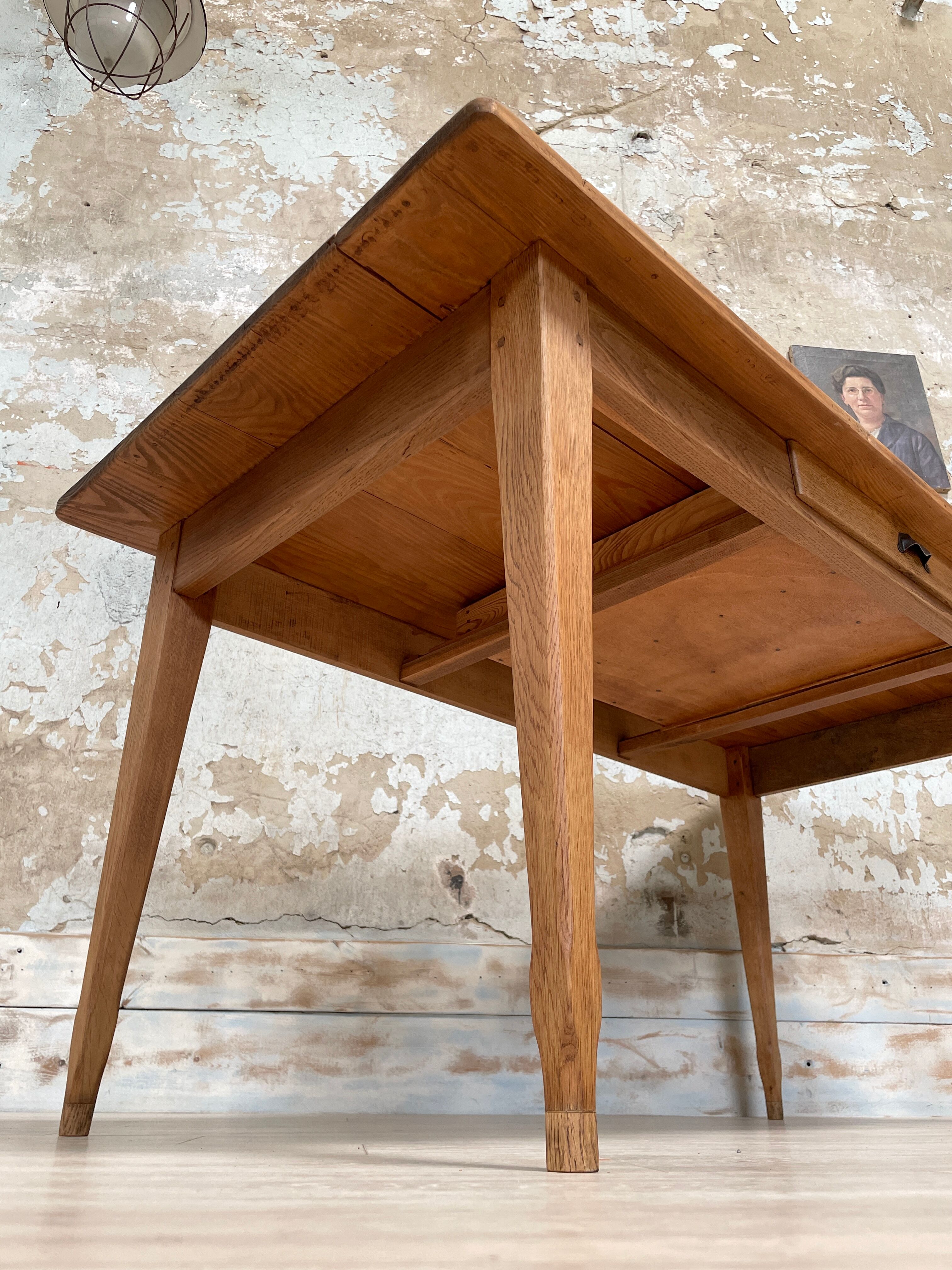 Vintage farmhouse table with spindle legs.