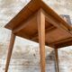 Vintage farmhouse table with spindle legs.