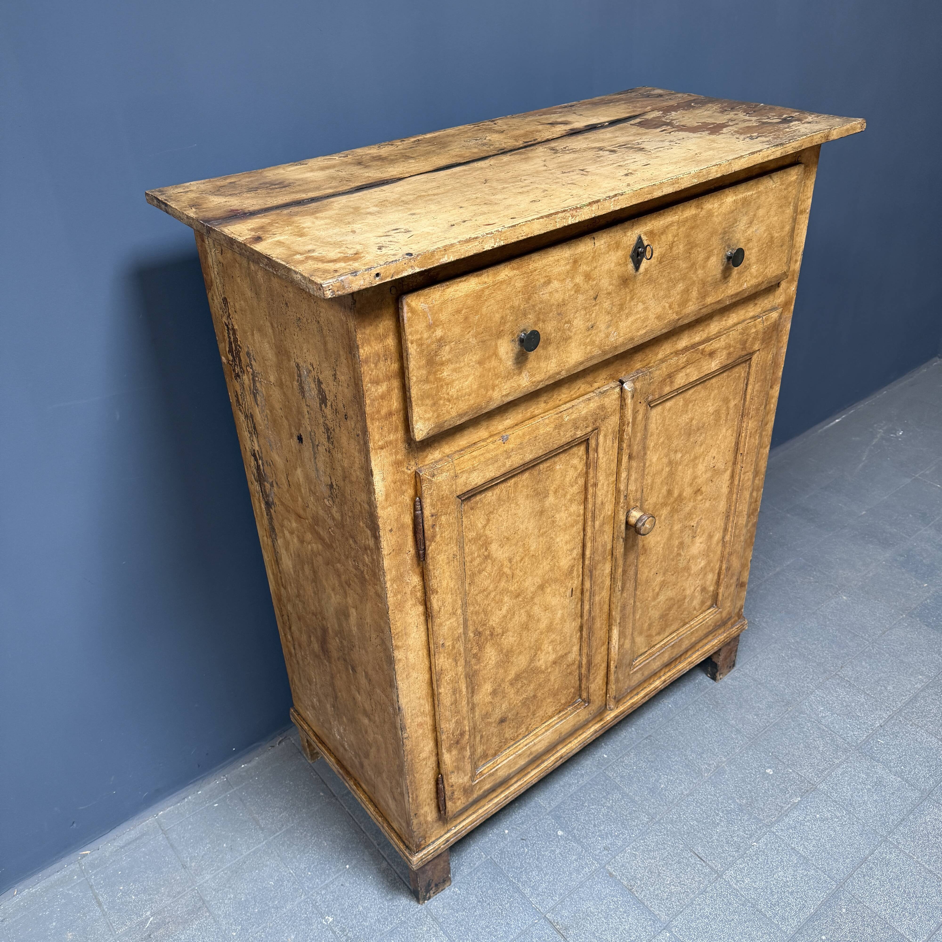 Old marbled ochre yellow French farmhouse cabinet