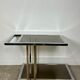 Belgo chrome serving cart/rolling table in chromed and gold-plated brass, 70s
