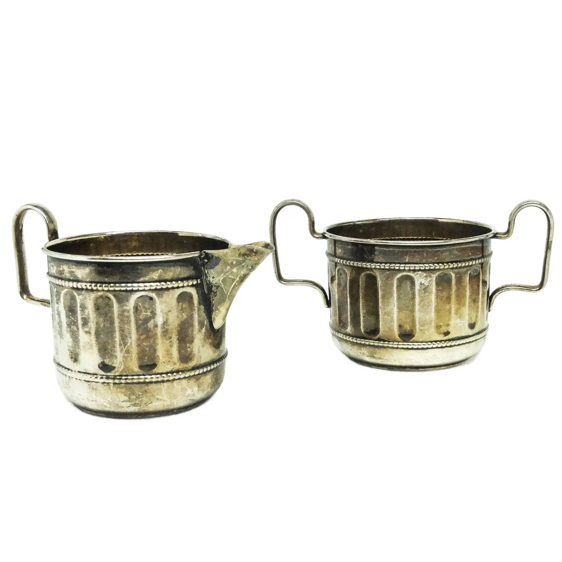 Set of sugar bowl and milk jug, neoclassicism with art deco influences, silver-plated brass, Belgium, 1930s.