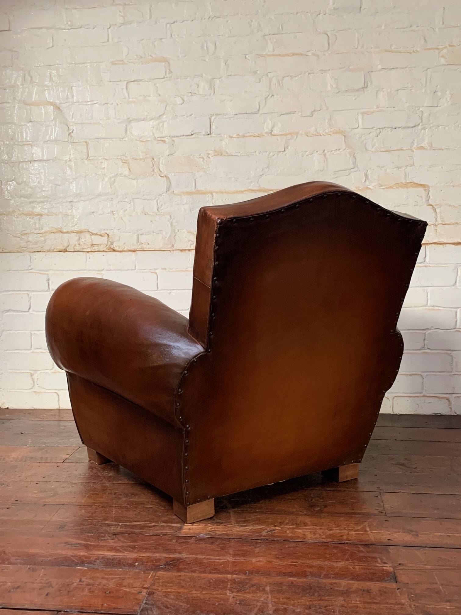 French leather club chair, chapeau de gendarme model circa 1950’s