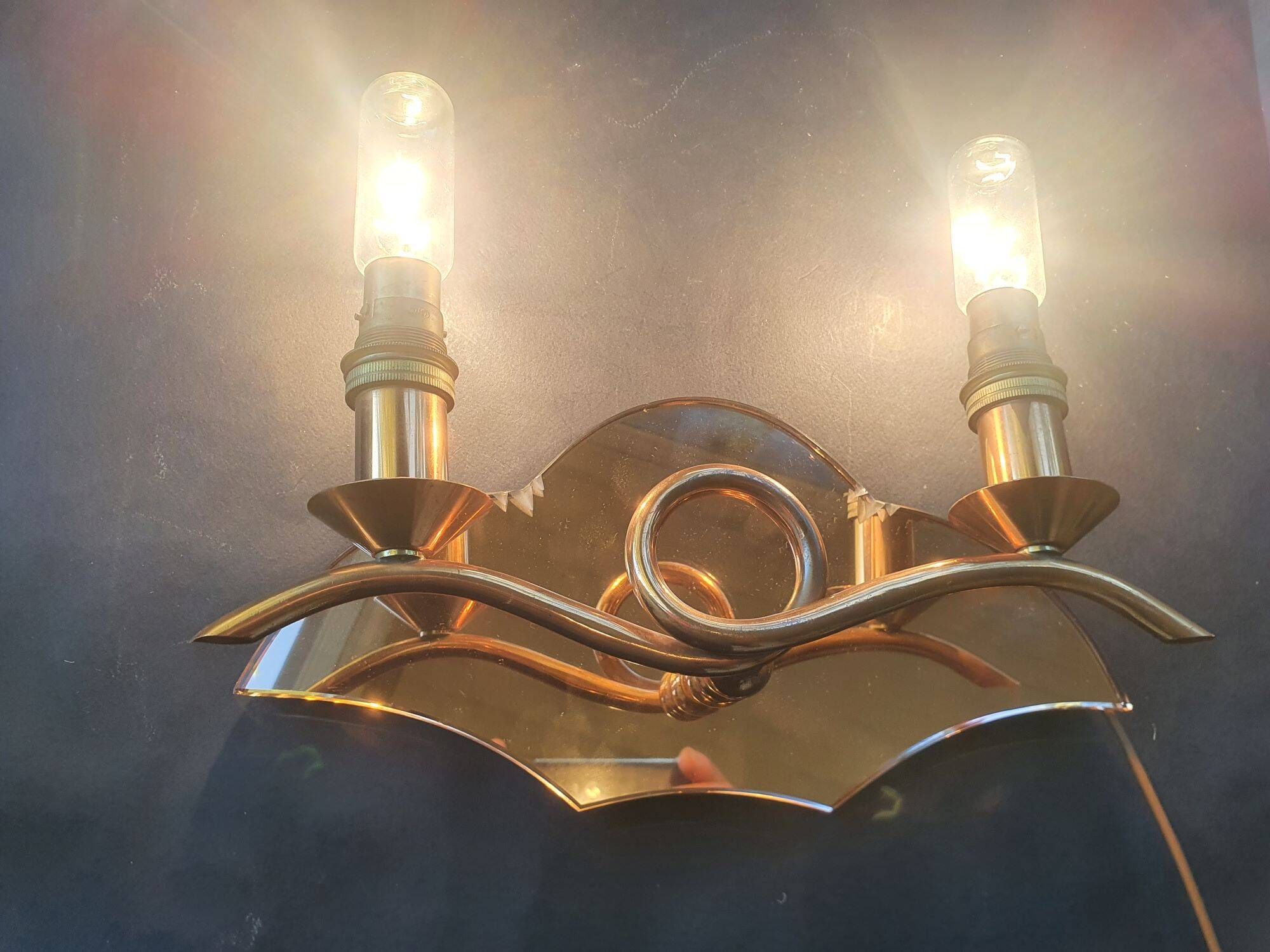 Copper wall lamp with 1940s Art Deco shades.