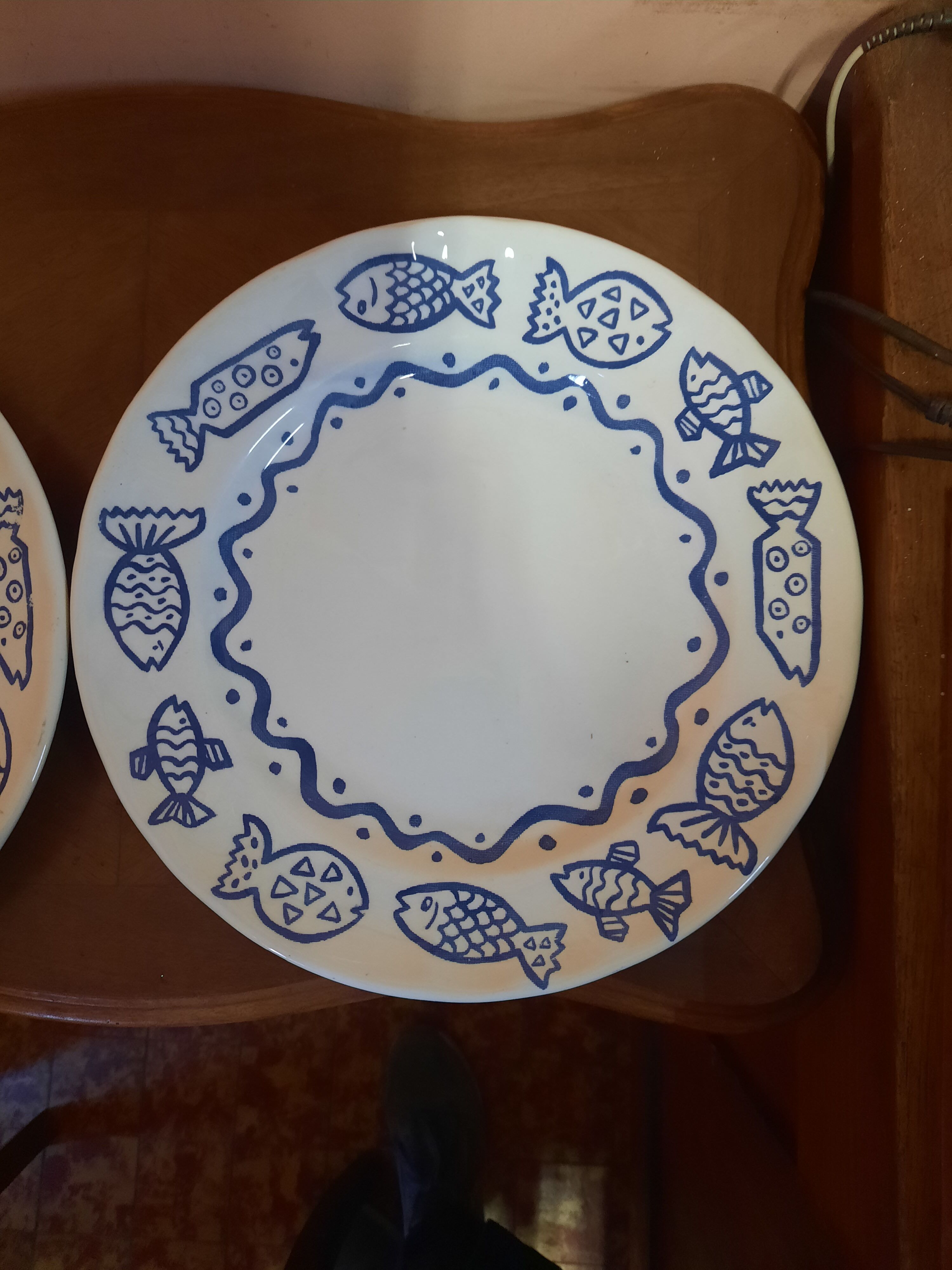 Duo of plates decorated fish