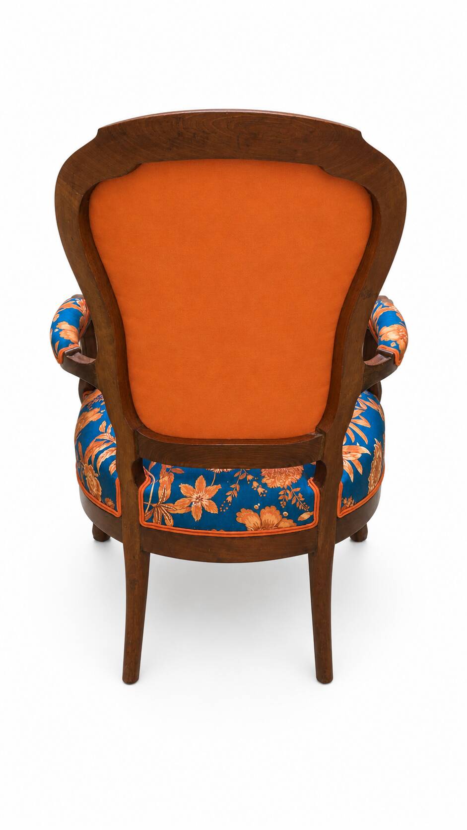 Restored Louis-Philippe cabriolet armchair, blue and orange floral fabric.