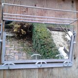 Former Wall coat hangers painted in gray iron