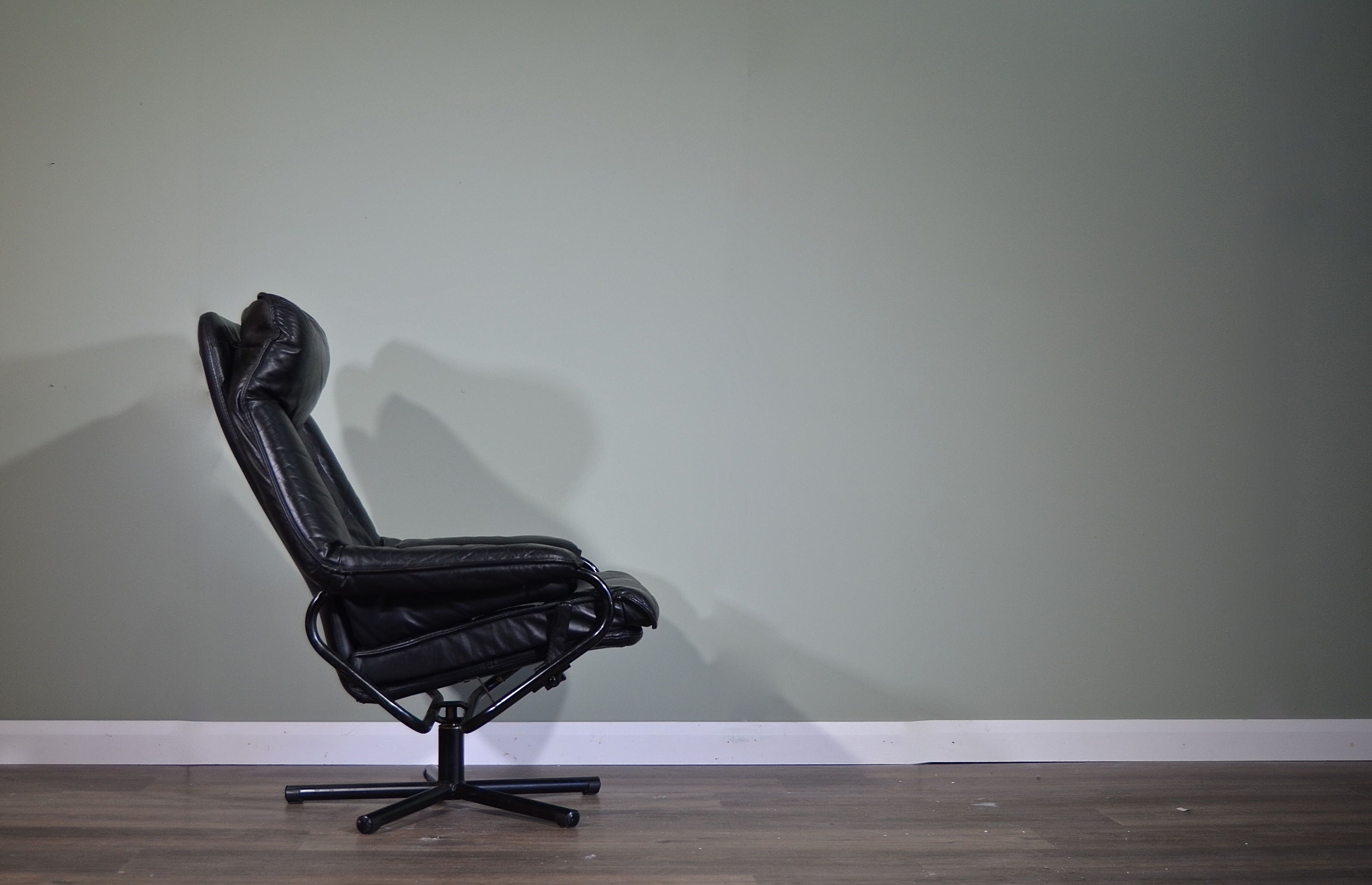 Norwegian Skoghaug industries vintage black leather swivel reclining chair