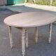 Louis Philippe round extendable dining table with renovated leaves and 4 extensions.