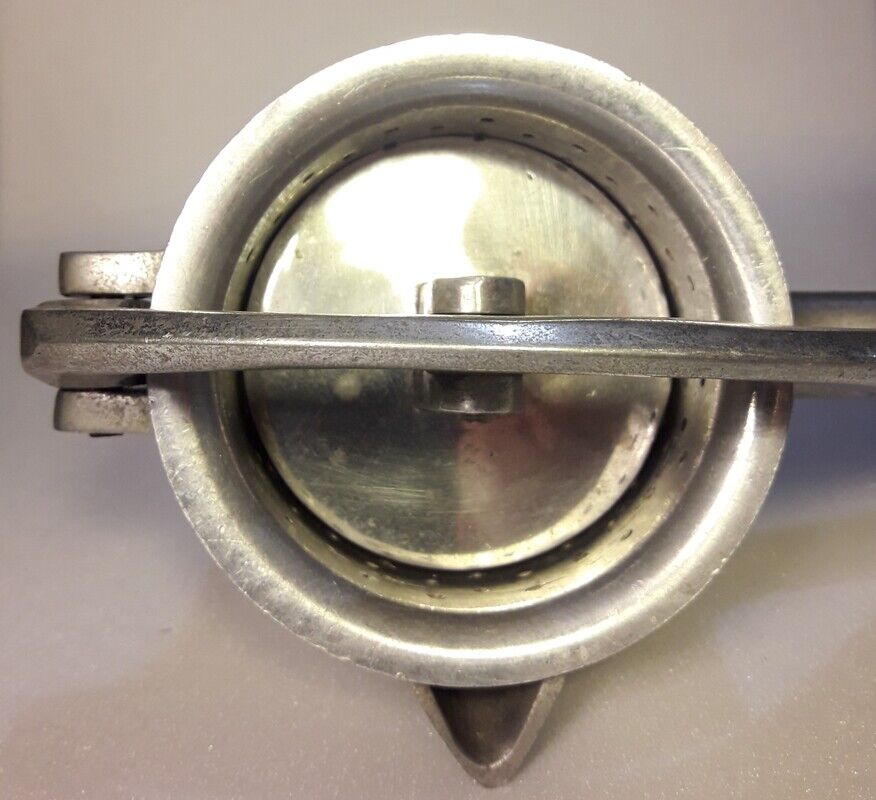Vintage grapefruit metal citrus press