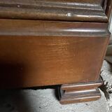 Antique wardrobe with a mirror door.