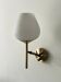 Brass and white opaline glass wall light, Arlus design 1950.