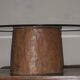 Carved antique tree stump coffee table with circular glass top