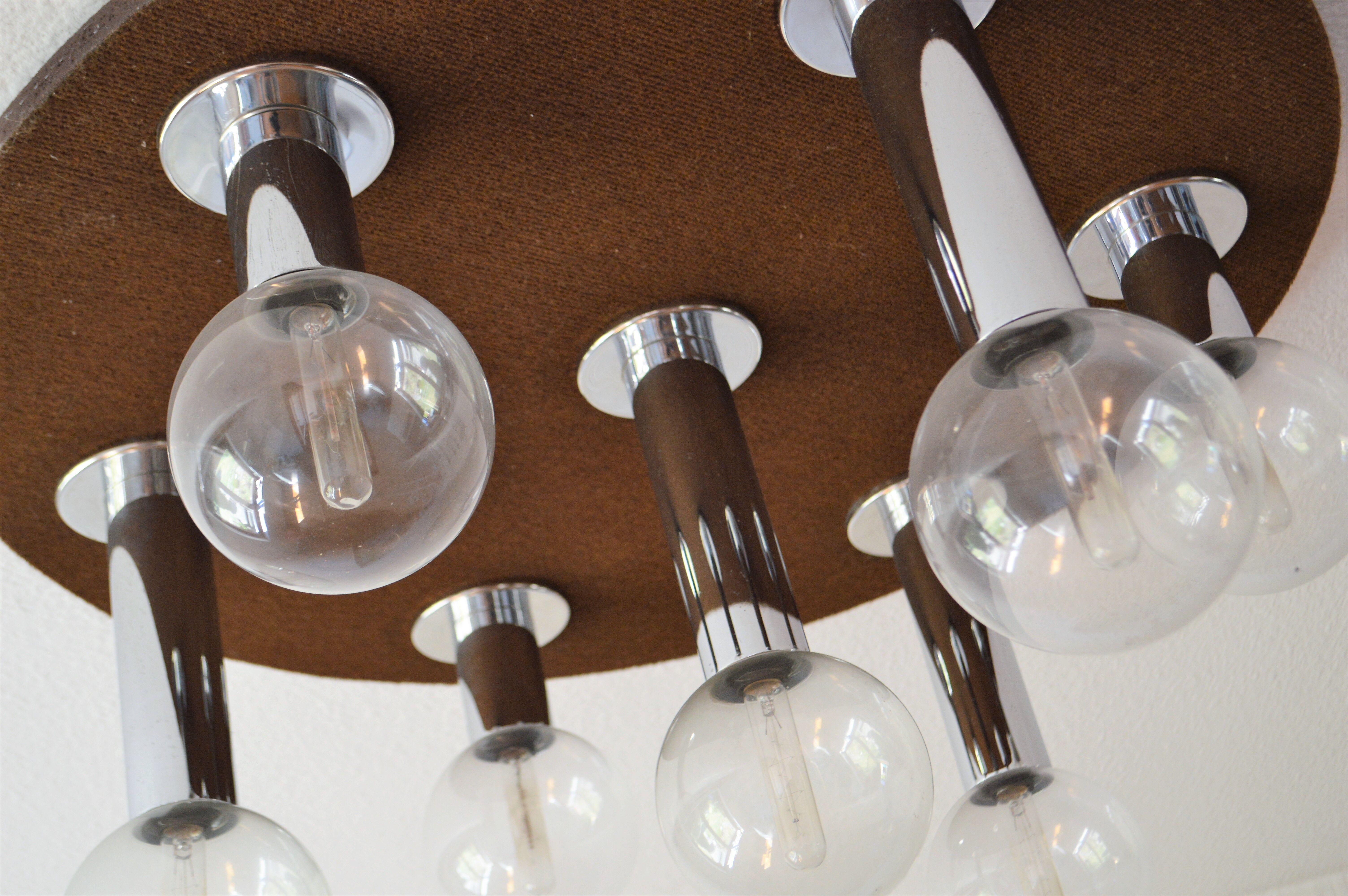 Vintage lamp of the 70s design in chrome glass space age