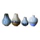 Set of 4 porcelain vases from the early 20th century by François Paul Louchet.