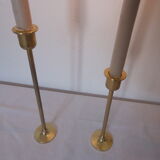 Duo of minimalist gold-plated candle holders