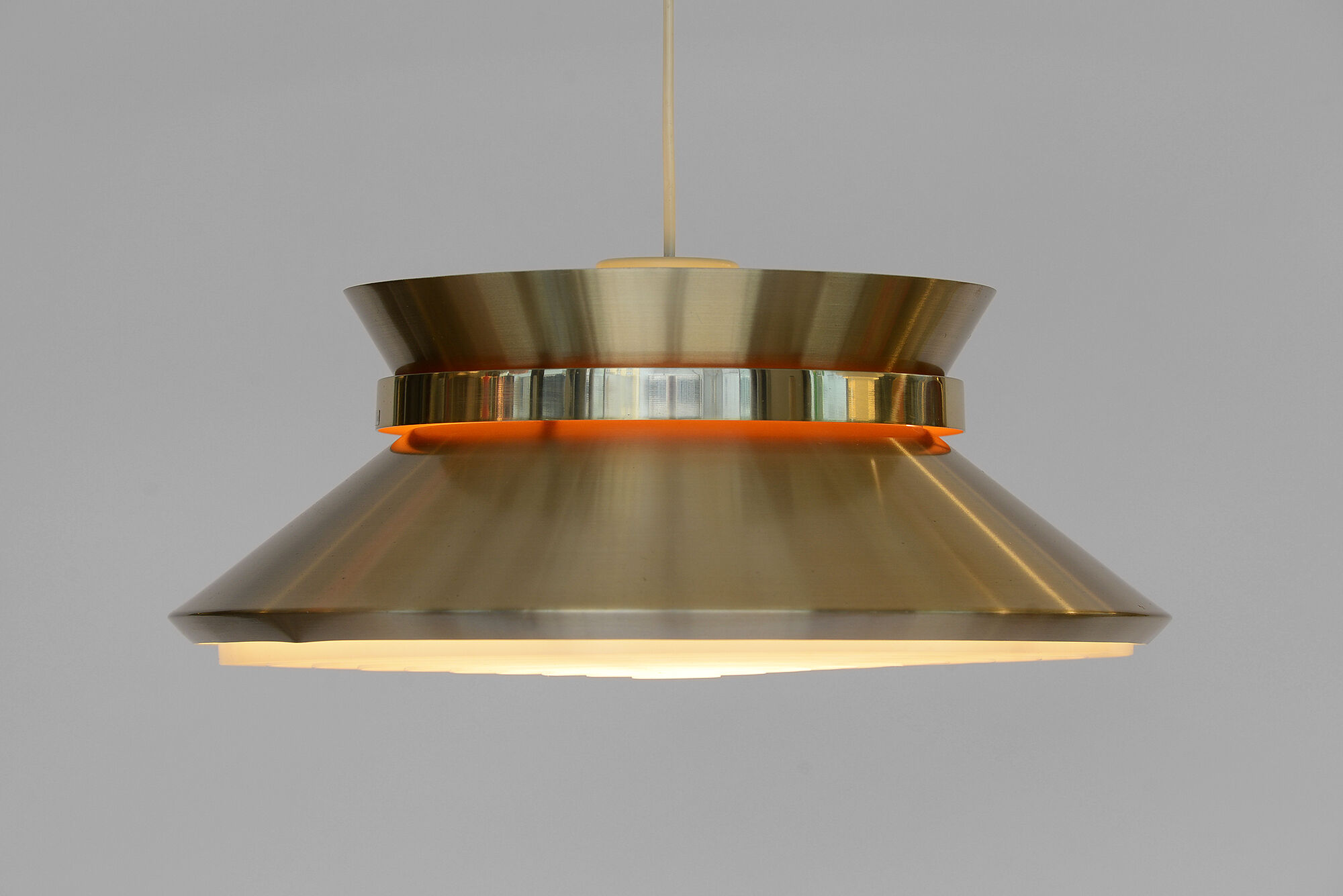Brass colored aluminium pendant light by Carl Thore for Granhaga Metall. Sweden 1970s.