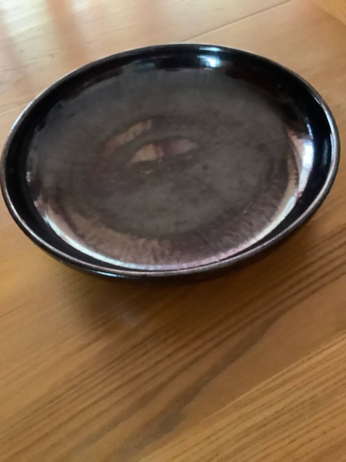 Plat rond noir Ceramart