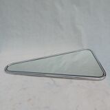 Designer mirror in the shape of a triangle from the 70's, a real Space Age