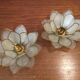 Pair of candlesticks in mother of Pearl and brass